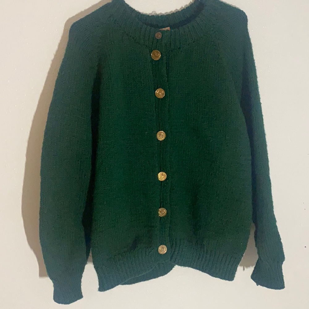 Thick Green sweater with beautiful buttons. Fits medium/large.